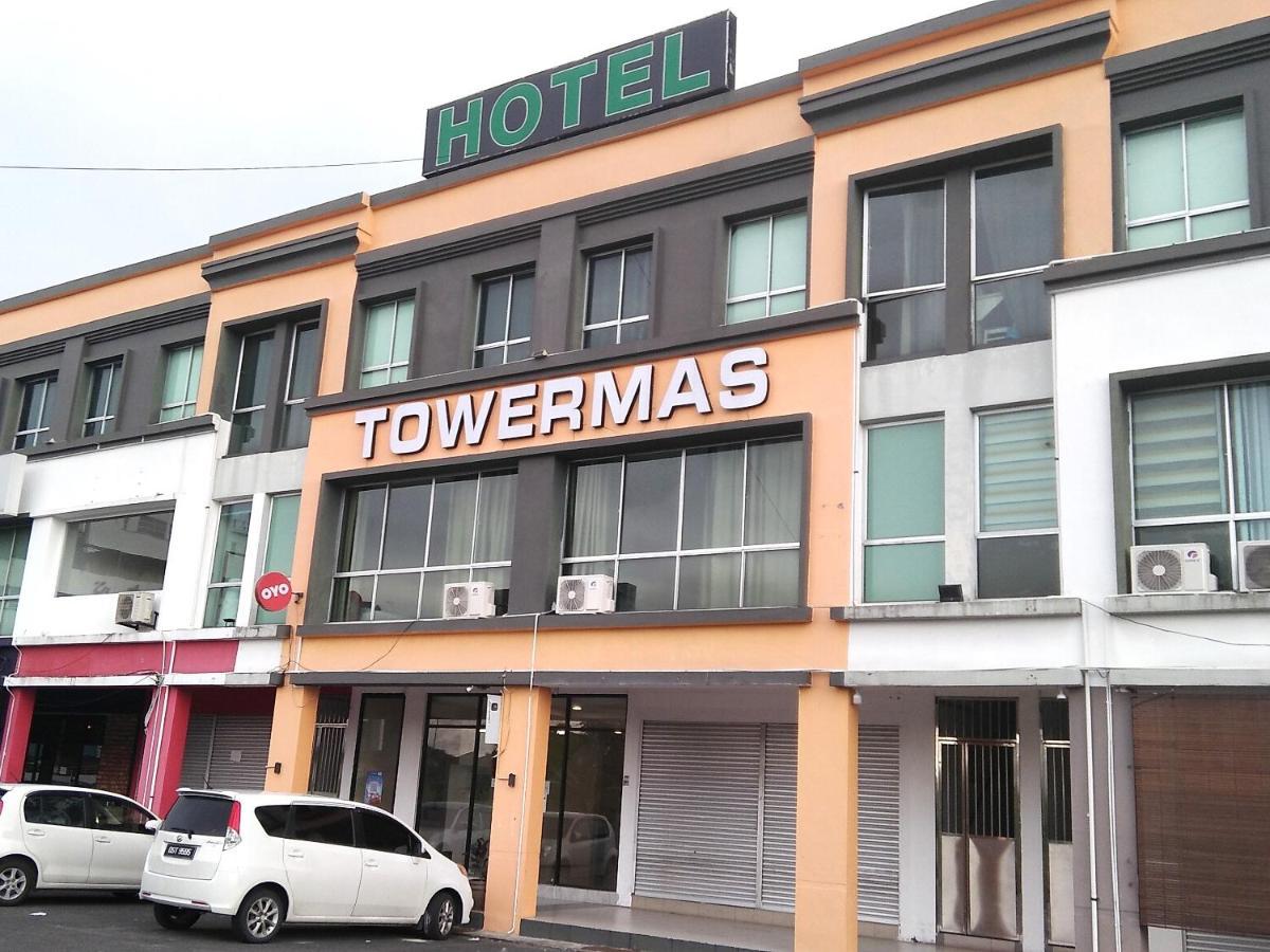 Oyo 90105 Towermas Hotel Сибу Екстериор снимка